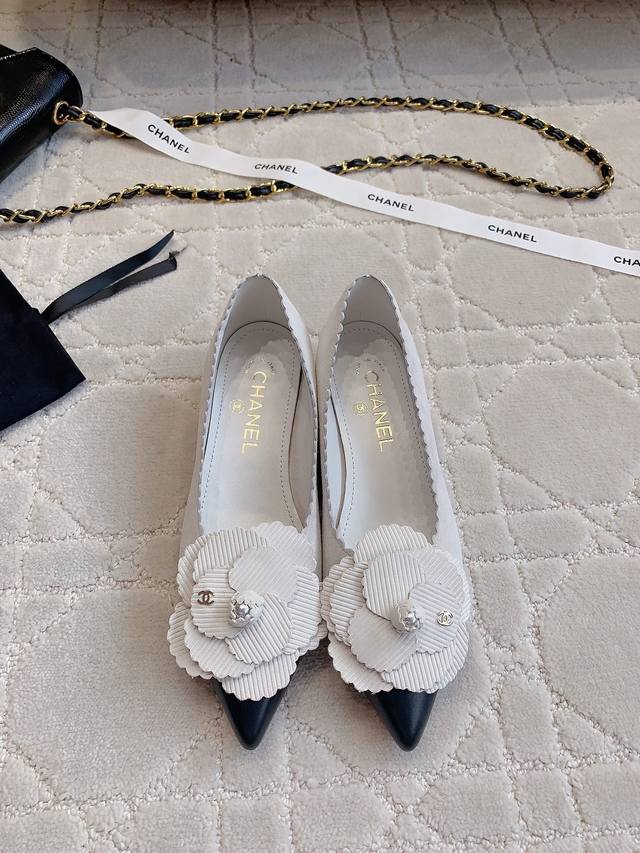 Chane*'s new Camellia flats are exquisite and graceful, looking great on the fee