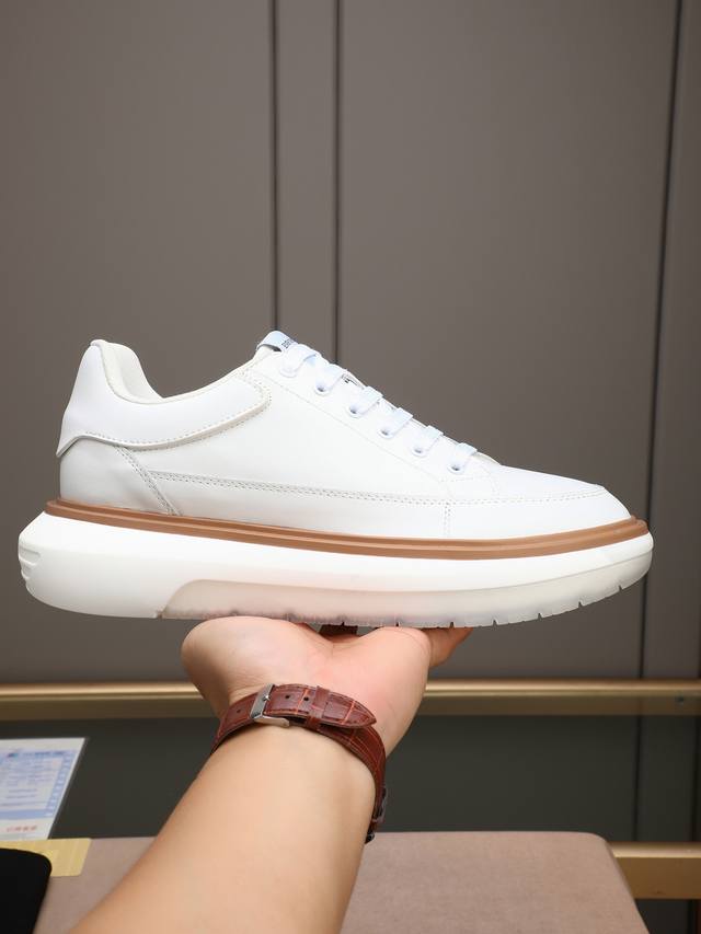 p Giorgio Armani men's sneakers. These shoes feature a calfskin upper and a smoo