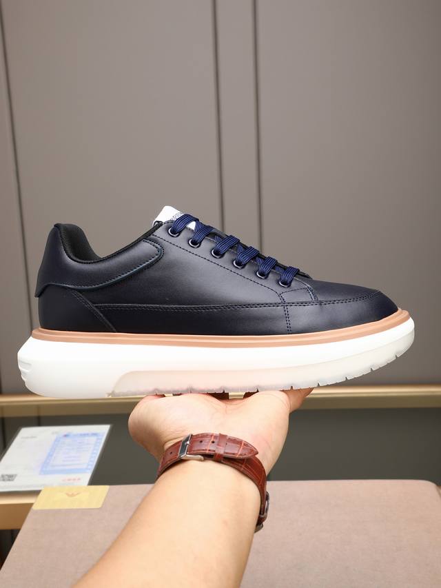 p Giorgio Armani men's sneakers. These shoes feature a calfskin upper and a smoo