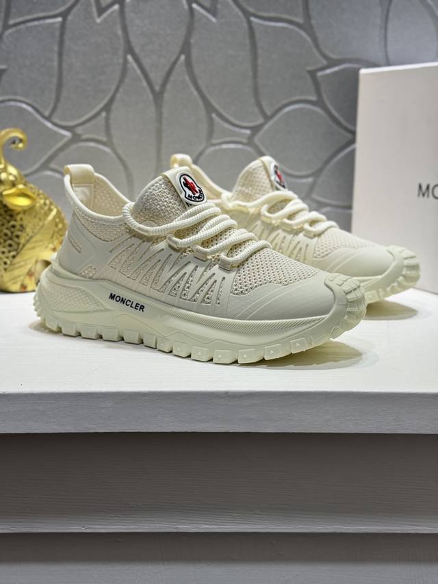 Moncler men's casual sneakers, featuring a comfortable, non-slip mesh upper, co