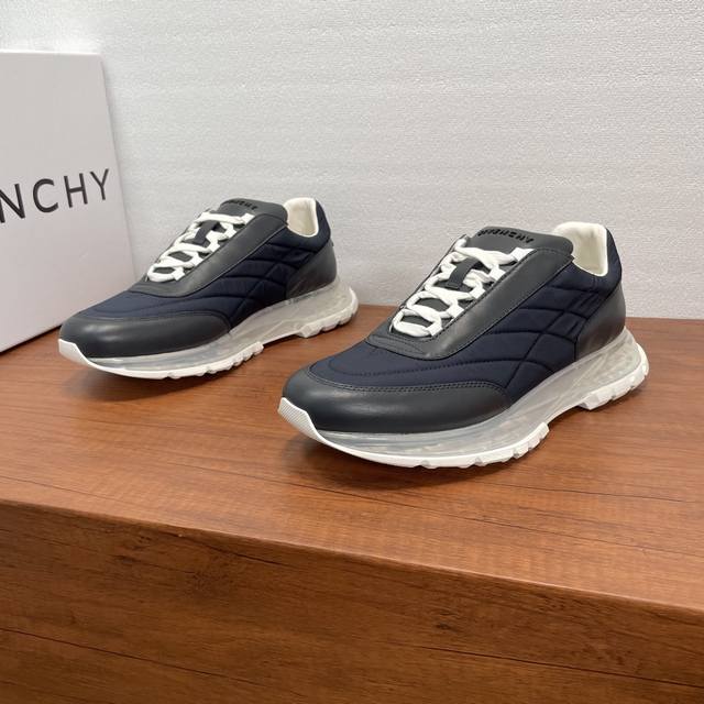 Givenchy's new men's patchwork air-cushioned platform sneakers. These shoes feat Givenchy's new men's patchwork air-cushioned platform sneakers. These shoes feat