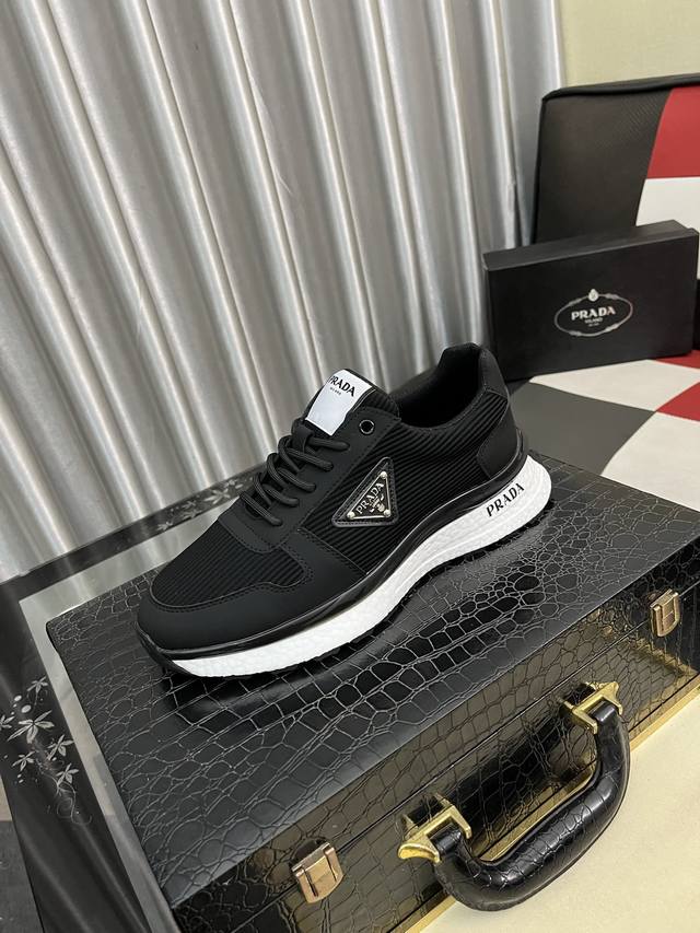 Factory Price: Prada Men's New Casual Shoes. These sneakers feature an imported
