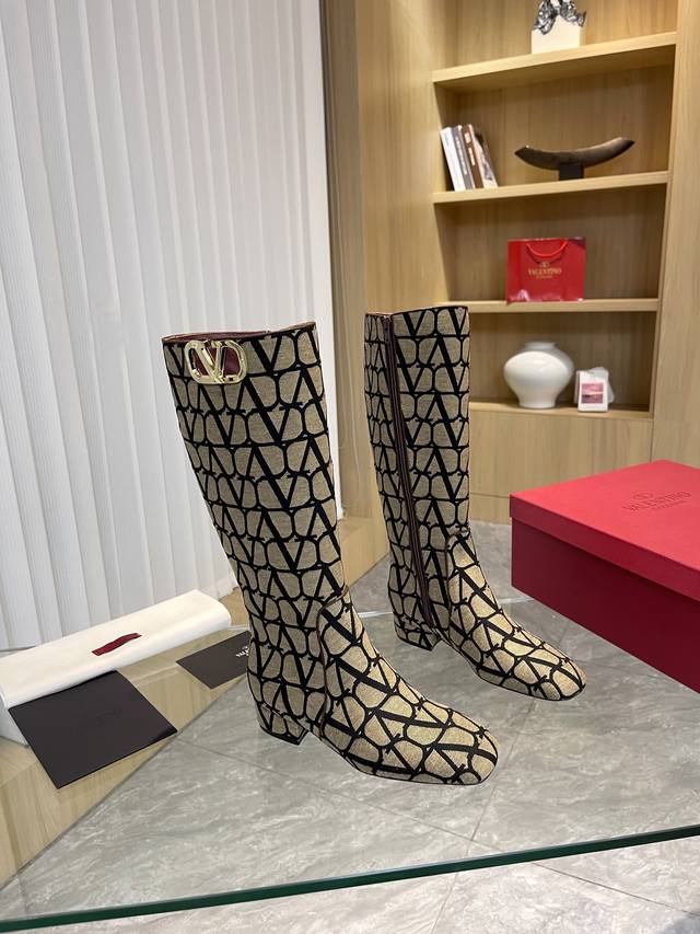 Ankle boots, long boots Valentino ~ Unique V-print fabric pattern with light go