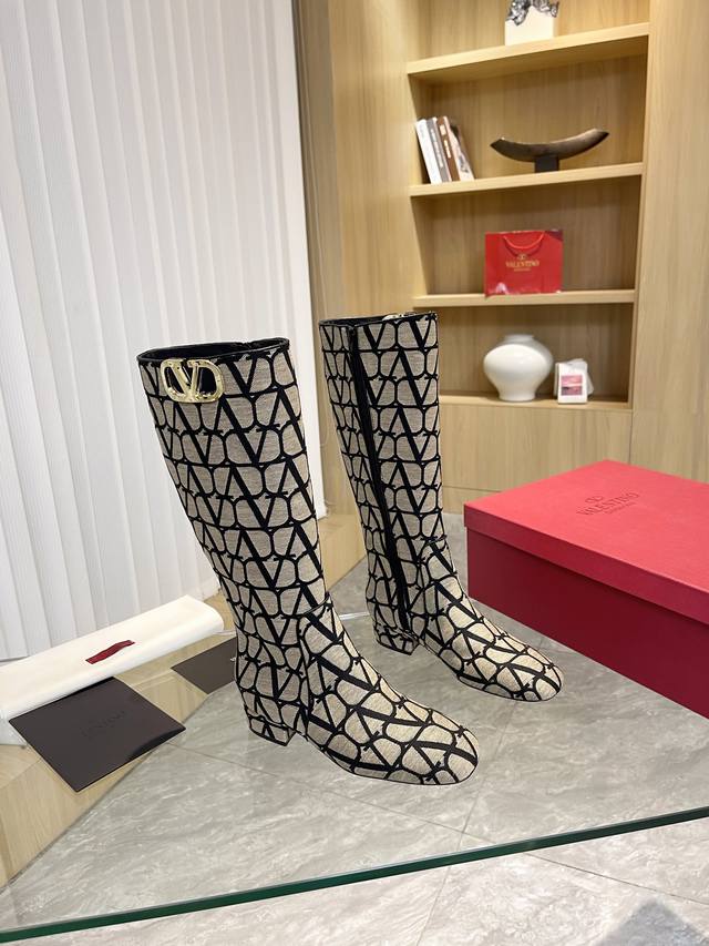 Ankle boots, long boots Valentino ~ Unique V-print fabric pattern with light go