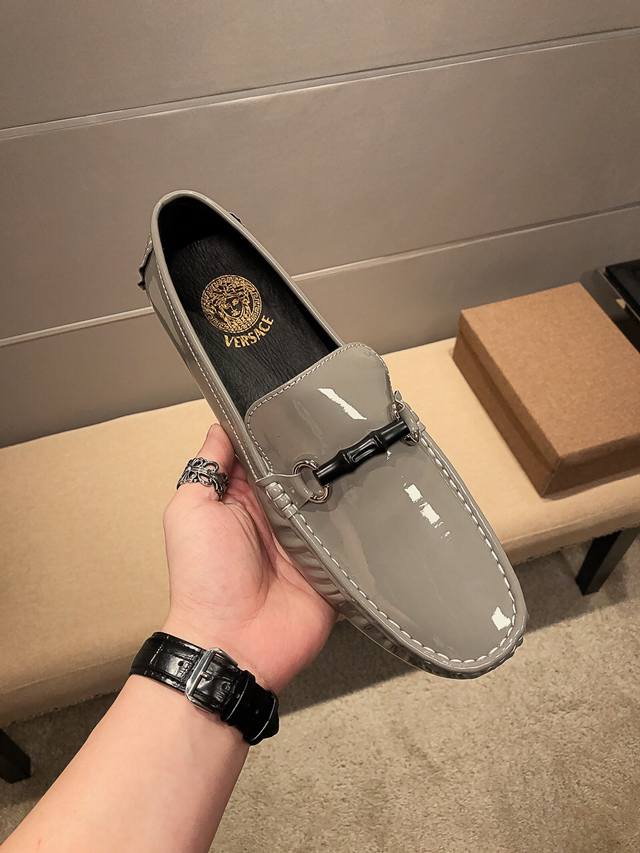 Authentic Versace product from the official Versace flagship store, a model seen