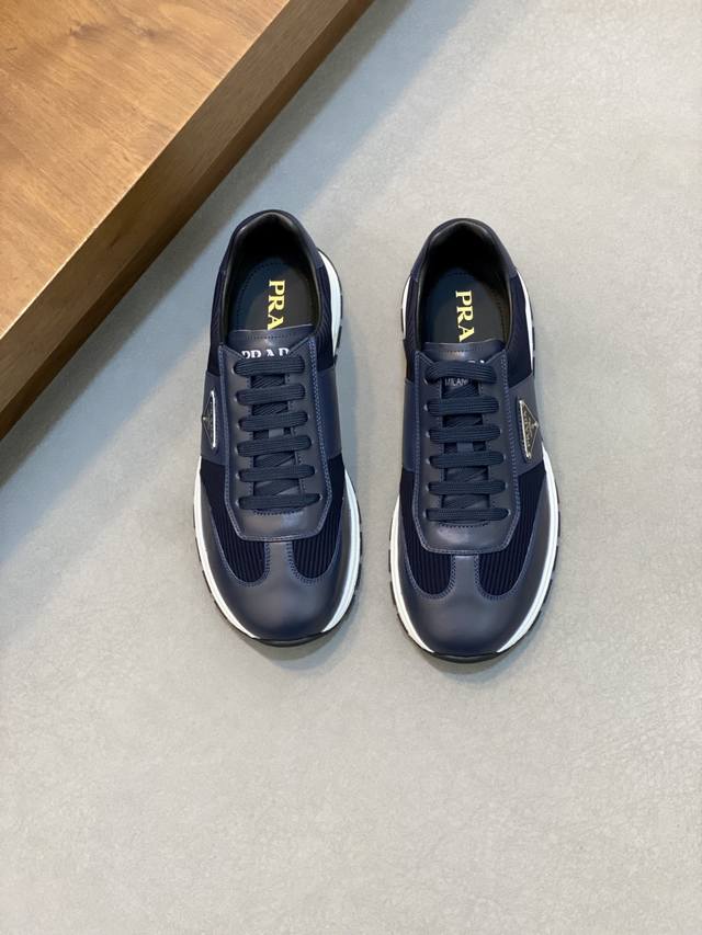 prada Prada men's new leather patchwork sneakers . These sneakers present a mod