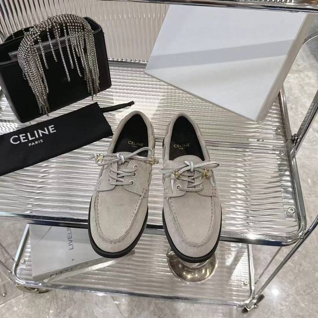 The classic Celine Bateau boat shoe returns! Wrapped laces create a casual silh