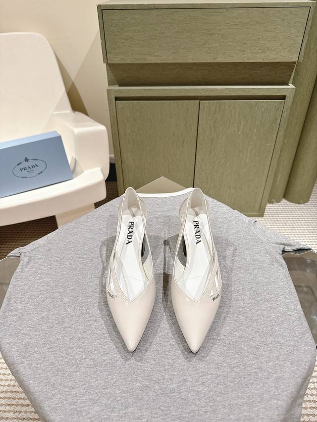 224 Premium Edition Prada's newest pointed silk Mary Jane shoes, featuring a ret