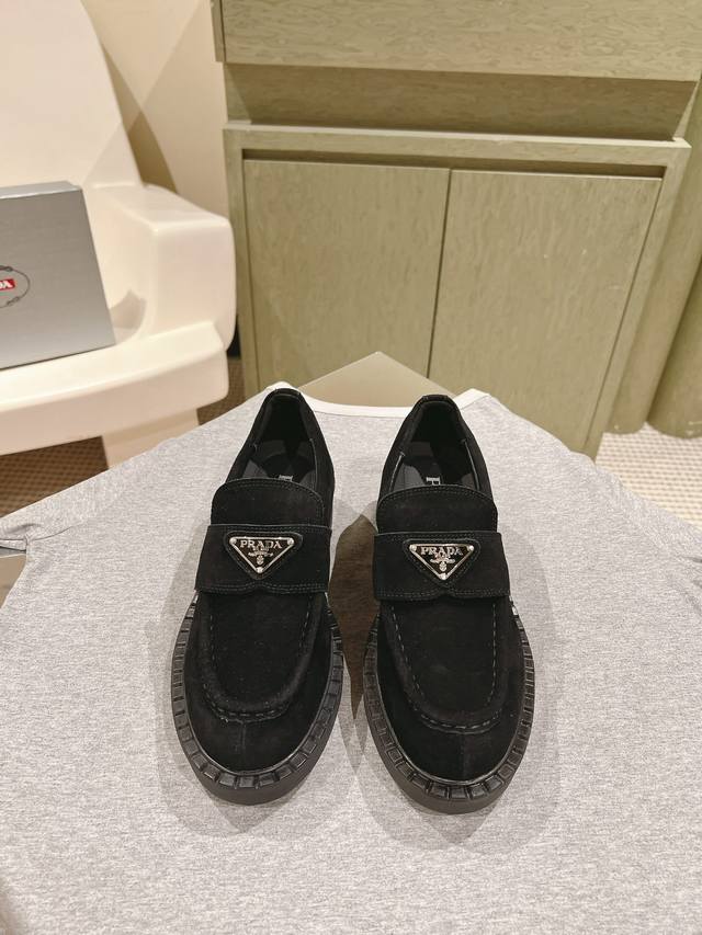 Couple's style 224 prad . These are Prada's new slip-on thick-soled loafers. Th