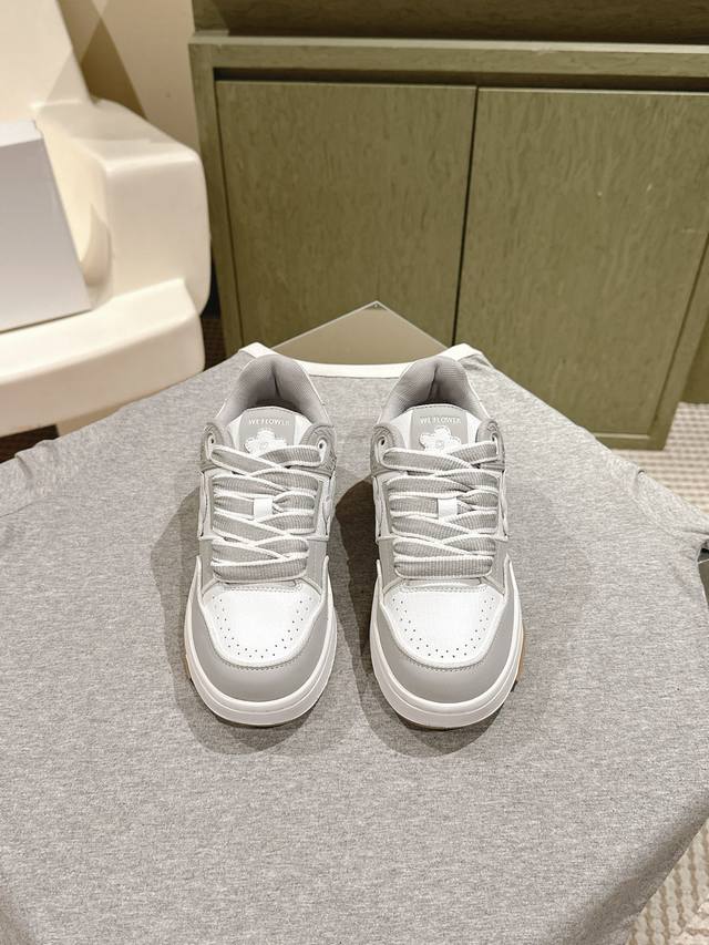 Weflower, a trendy, niche brand, offers couples a retro jogging shoe, worn by co