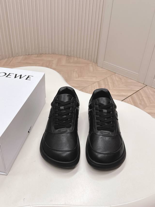 Loewe 2025 leather Dexter shoes for couples. The asymmetrical toe cap is a clas