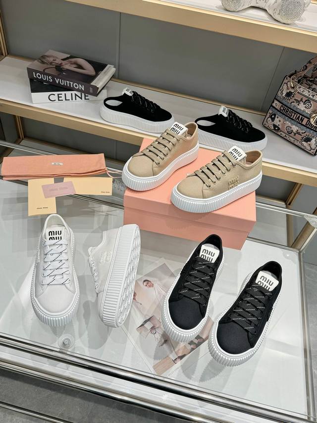 Miumiu's latest Velcro canvas platform sneakers. Originally sourced, developed,