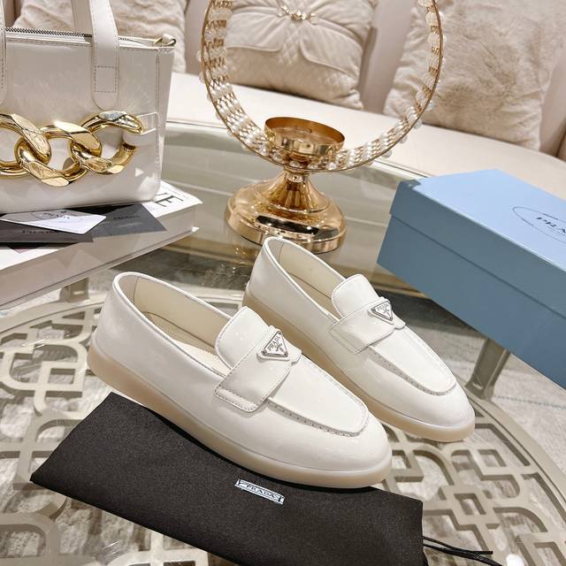 prada New Spring/Summer Slip-On Loafers from Prada! Metal triangle logo showcase