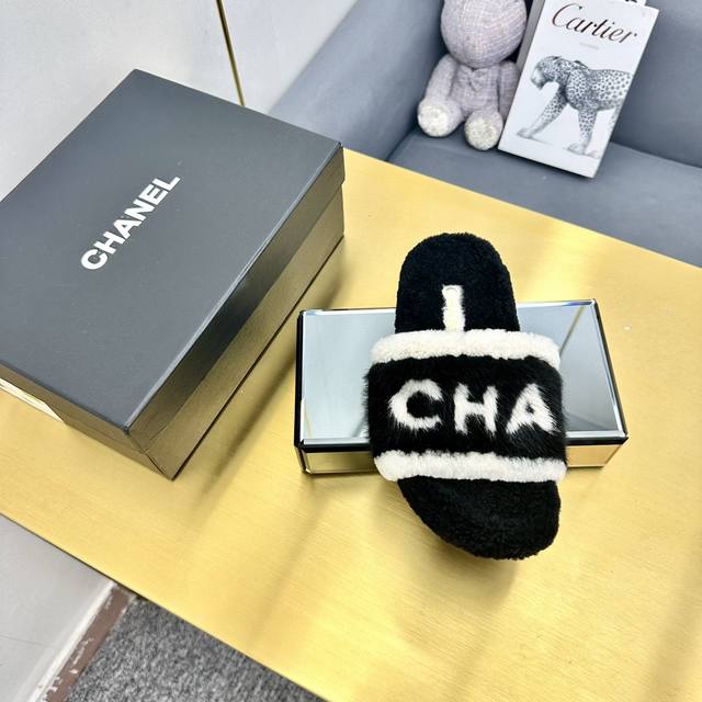 Chanel White embroidered striped logo and fleece lining flat slippers. New fall/