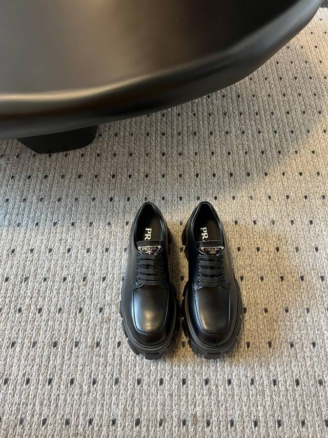 prad* It's hard not to love Prada's new thick-soled loafers . This new one has