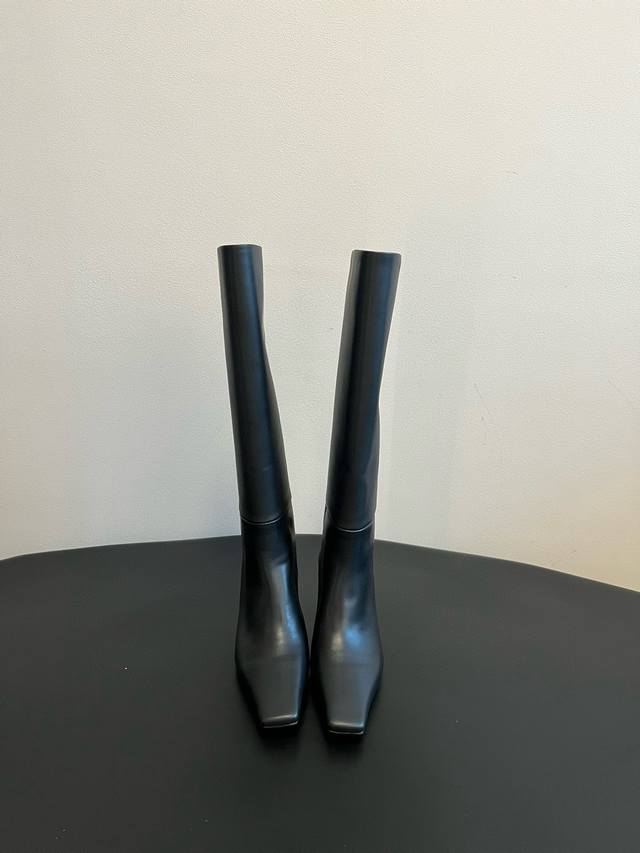 proenza Schouler*'s new black long boots are made of exquisitely selected leathe