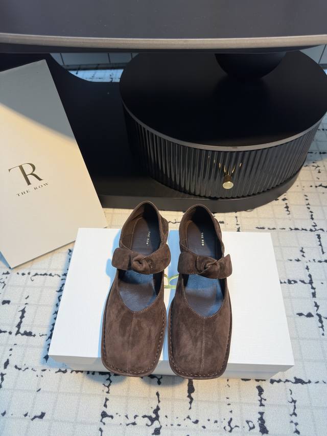 the Row 25Ss square-toed bow-knot flat Mary Janes . Two pairs of golden beautie