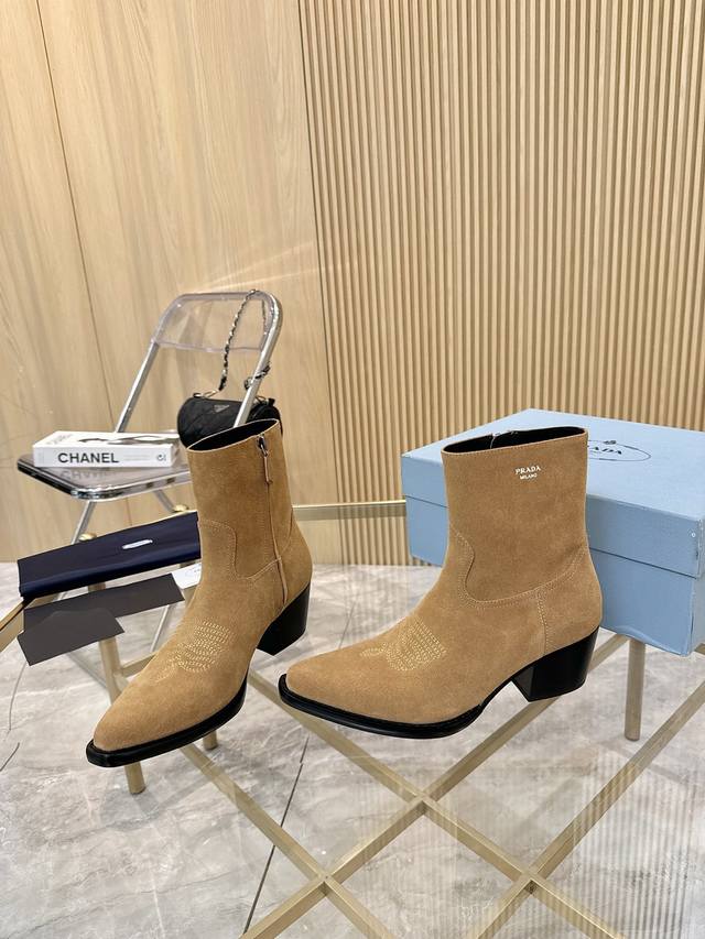 Factory-exclusive, top-of-the-line Prada classic pointed-toe boots are perfect