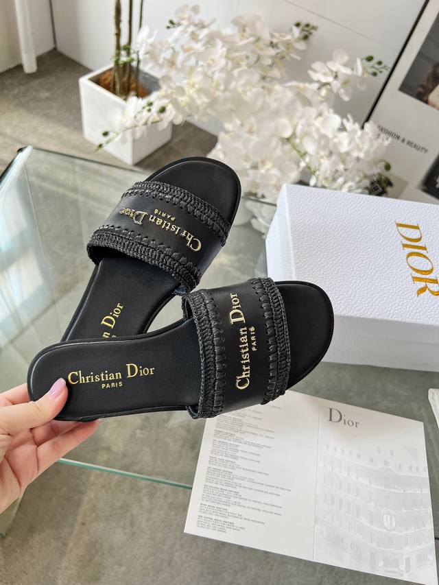 A new classic from Dior. These hand-woven raffia fingerless sandals are a retro