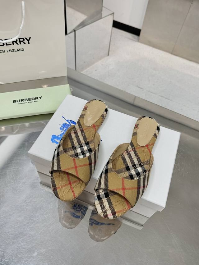 New arrival: Burberry block heels and flat slip-on slippers. Vulcanized Burberr