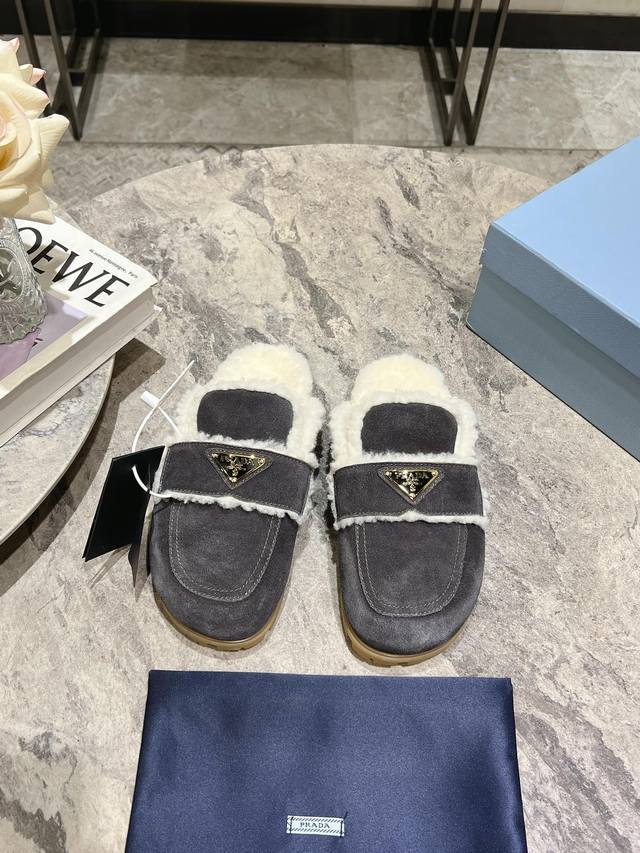 Exclusive first release of Prada's new thick-soled British-style furry slippers