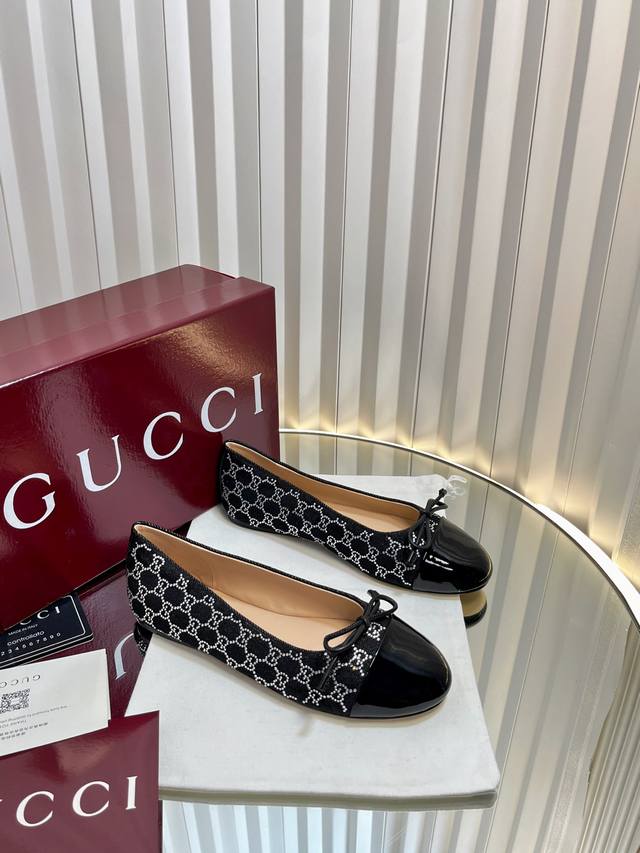 Double G rhinestone-embellished ballet flats. These ballet flats are crafted fr