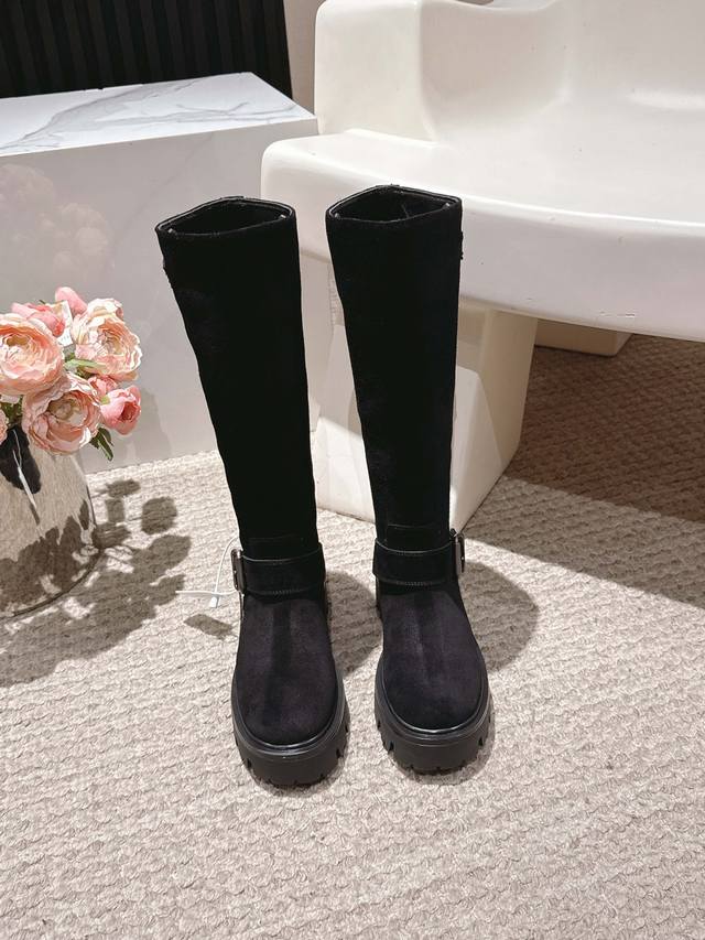 Premium-quality cowhide and suede . Prada's latest triangle logo and belt buckl