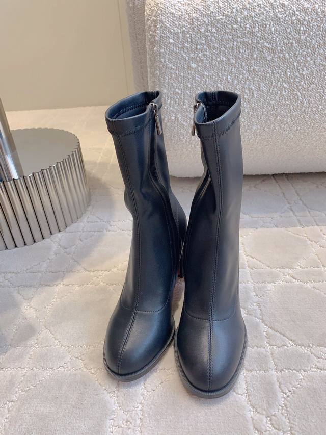 50" 60" 70" Christian Loubouti's newest high-heeled chunky-heeled sock boots are