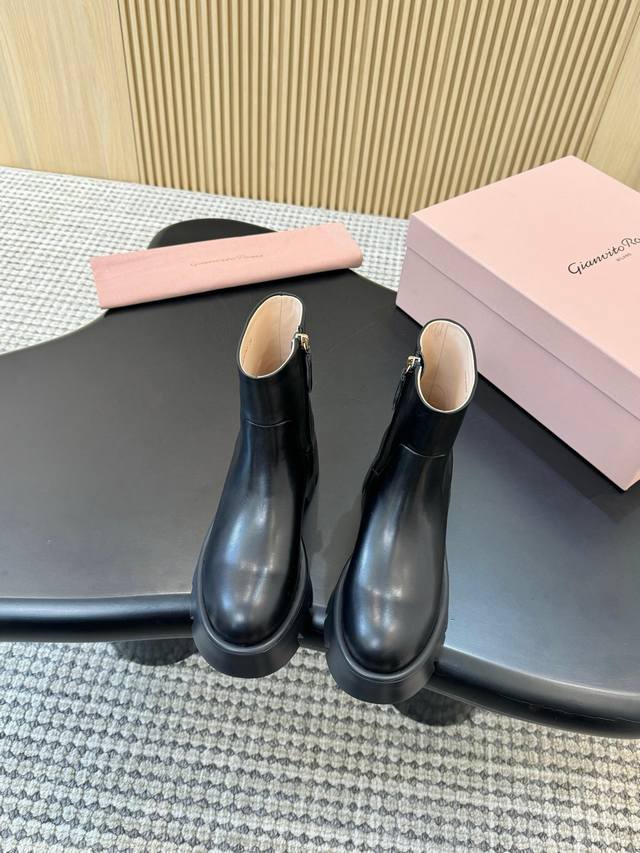 Gianvito Rossi height-enhancing, thick-soled, side-zippered ankle boots ( ). The