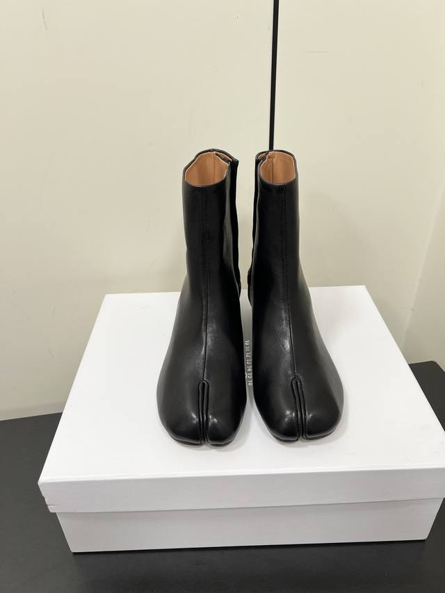 Maisonmargiela Mm6 split-toe boots. Highly recognizable, incredibly comfortable,