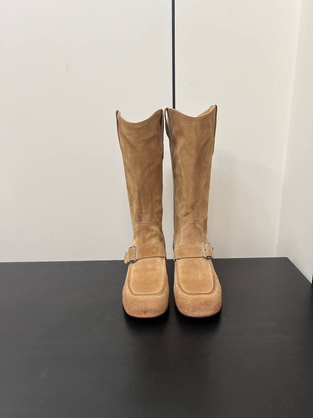 Each pair of Maison Margiela suede, rubbed-leather boots is unique. Wide, strai