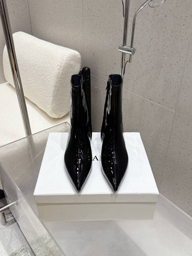 New early fall vintage wedge-heeled ankle boots from niche fashion brand Khaite