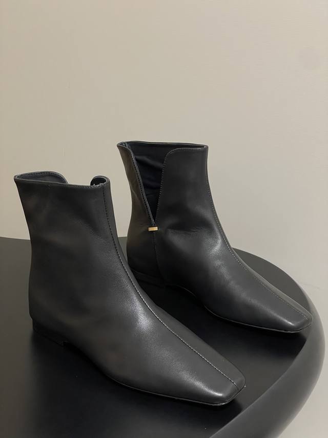 The Row's new fall/winter 25 Tr flat-soled V-neck ankle boots are super comforta