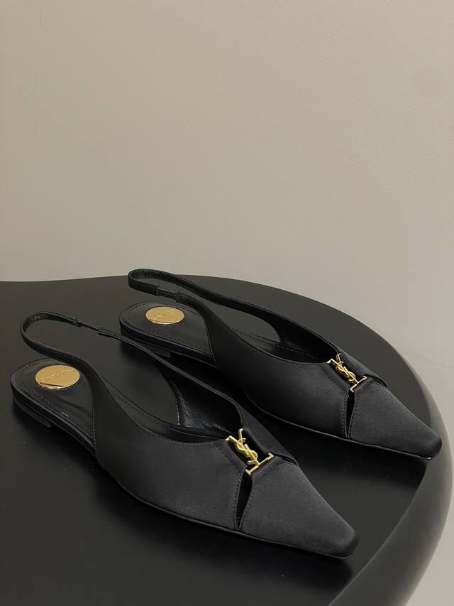 Saint Laurent's latest runway model, YSL's small square-toe flat sandals, show o