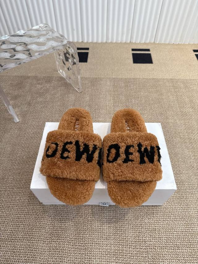 Loewe's classic autumn/winter lettered furry slippers. There are so many beautif