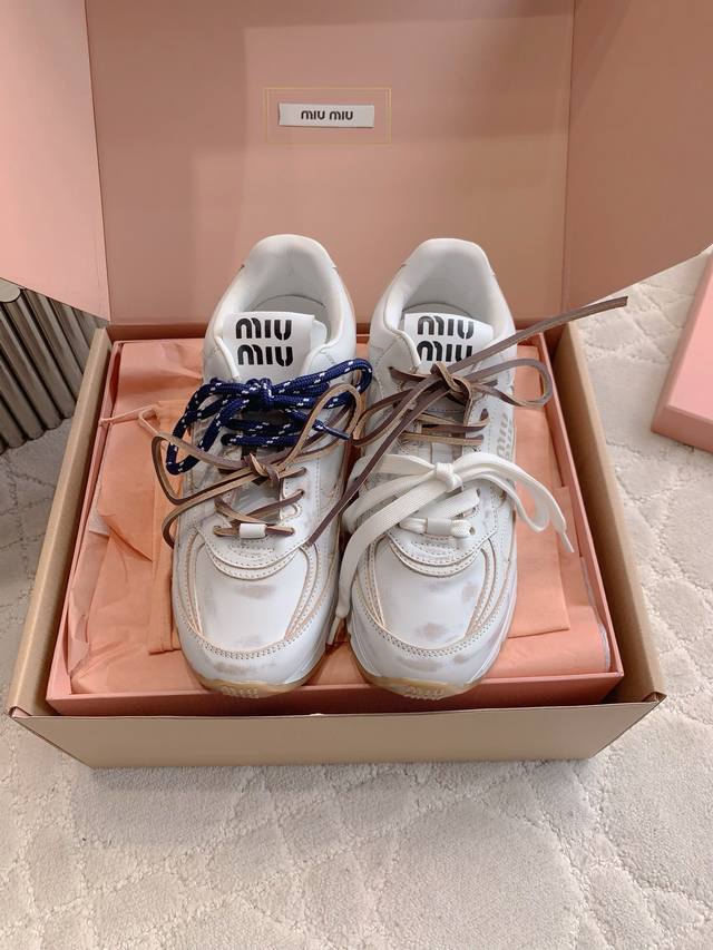 Mesh and leather surfaceMiu's new distressed dad shoes with thick soles instantl