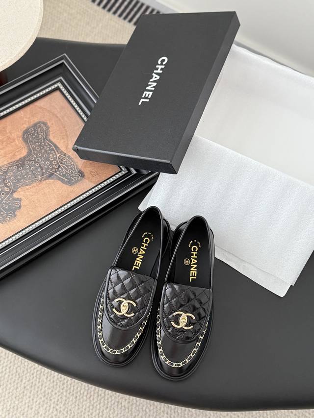 Chanel classic satchel buckle loafers . A basic shoe style. Slender, compact,