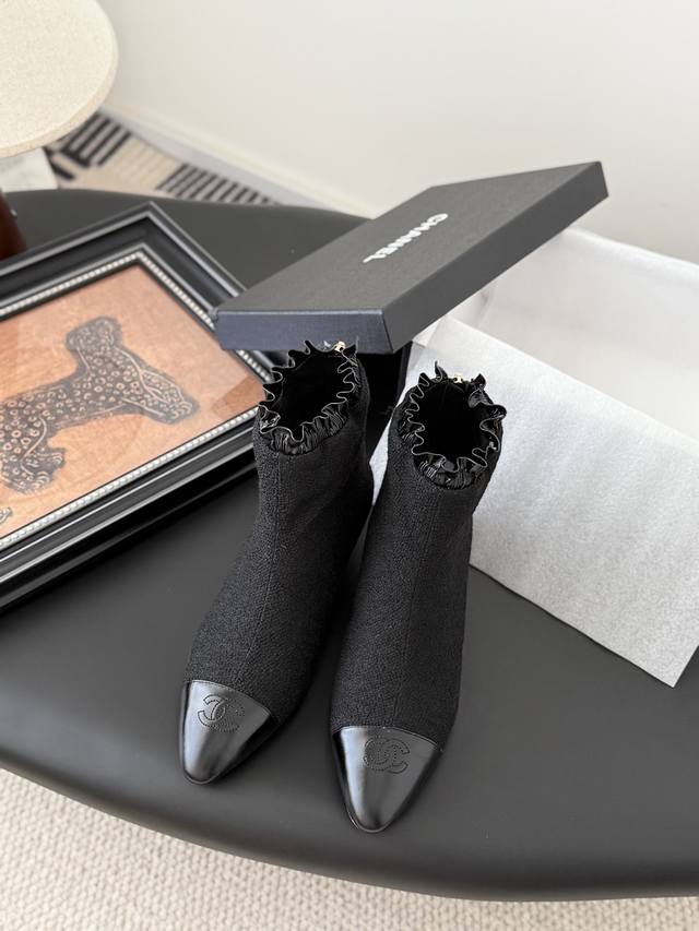 Chanel 25p show style thick-soled wedge-heeled Mary Jane boots . Heel height is