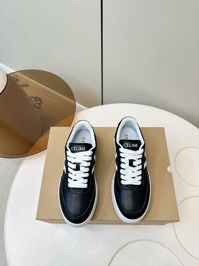 Celine 25 new casual and fashionable white sneakers with thin and thick soles .