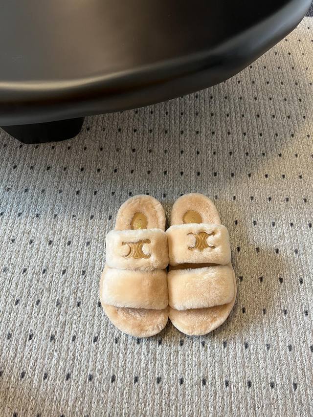 Celine Aw furry slippers . So cute and furry. Super comfortable and soft, with