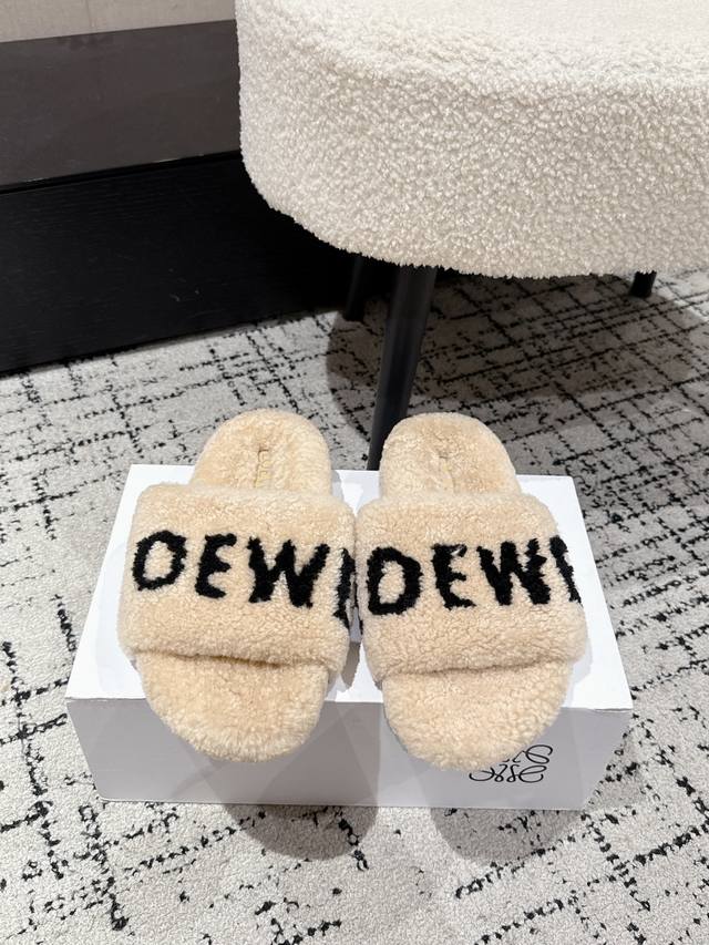 Loewe 25's latest autumn/winter furry slippers with lettering. There are so many