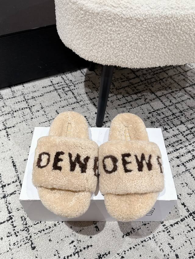Loewe 25's latest autumn/winter furry slippers with lettering. There are so many
