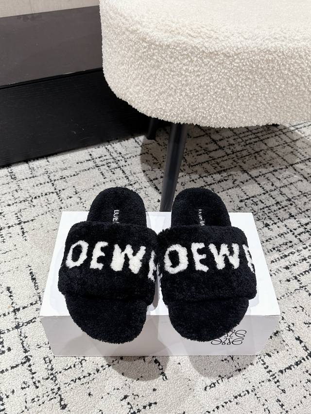 Loewe 25's latest autumn/winter furry slippers with lettering. There are so many