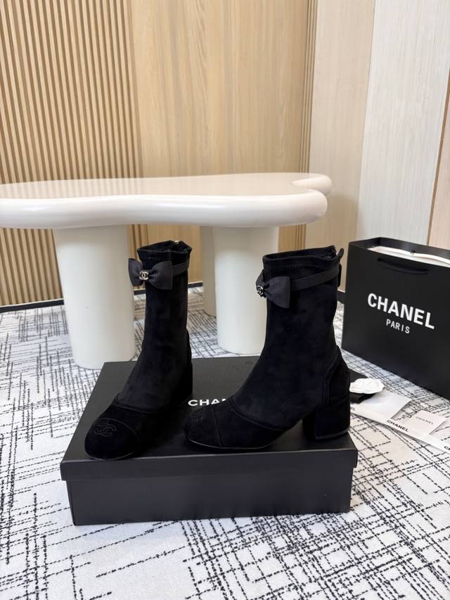 Chanel Classic Block Heel Zippered Ankle BootsThese boots cleverly incorporate