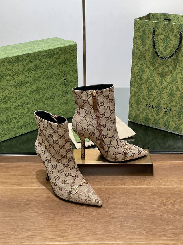 G's new Gucci Horsebit high-heeled ankle boots with pointed toe and bare ankle b