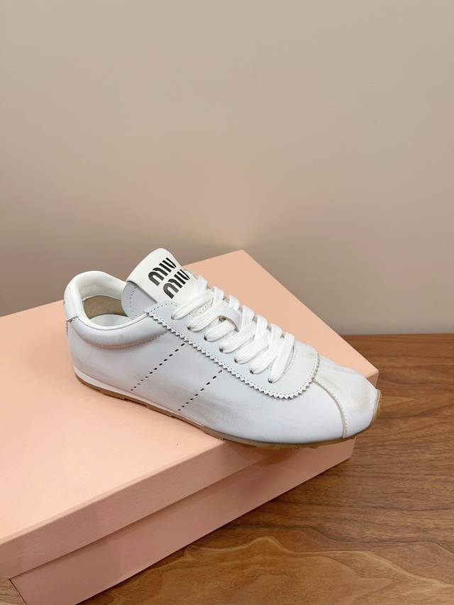 35-40 Miumiu's new Forrest Gump Denim sneakers from the early spring runway are