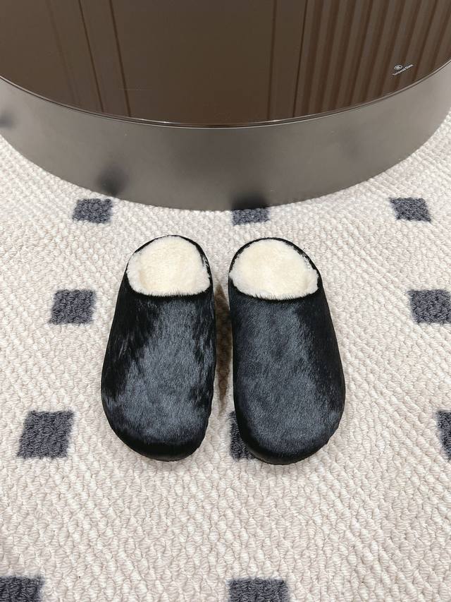 Wool-lined version, sizes 35-40 The new Therow Birkenstock slippers are minimal