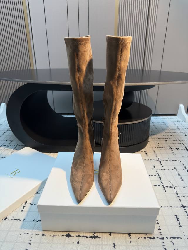 The Row's new high-heeled pointed toe boots are made of a suede-like material wi The Row's new high-heeled pointed toe boots are made of a suede-like material wi