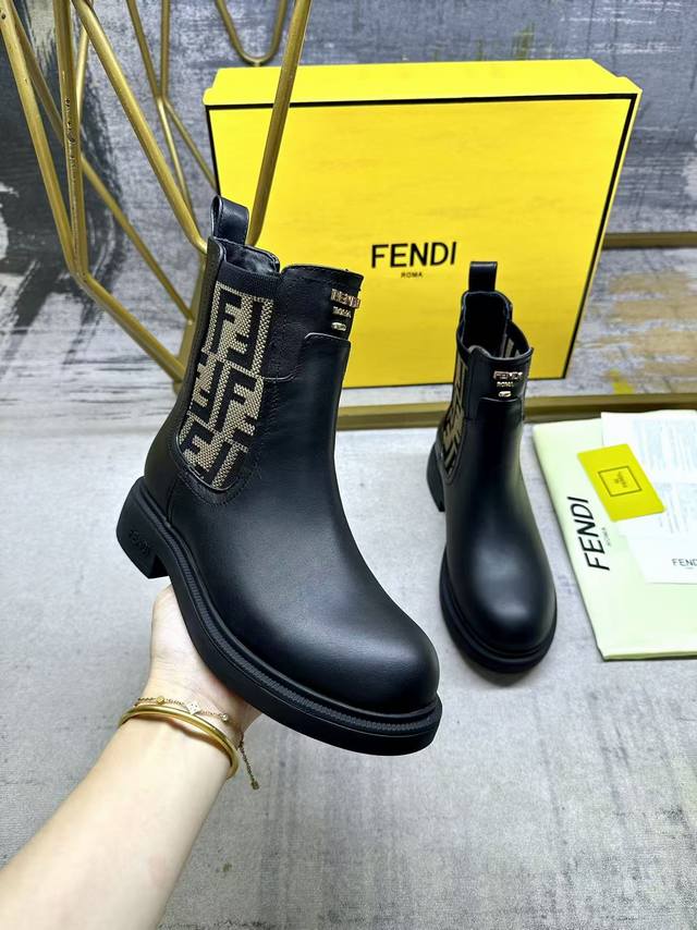 fendi new Chelsea boots, black cowhide fabric, sheepskin lining, gold buckle emb