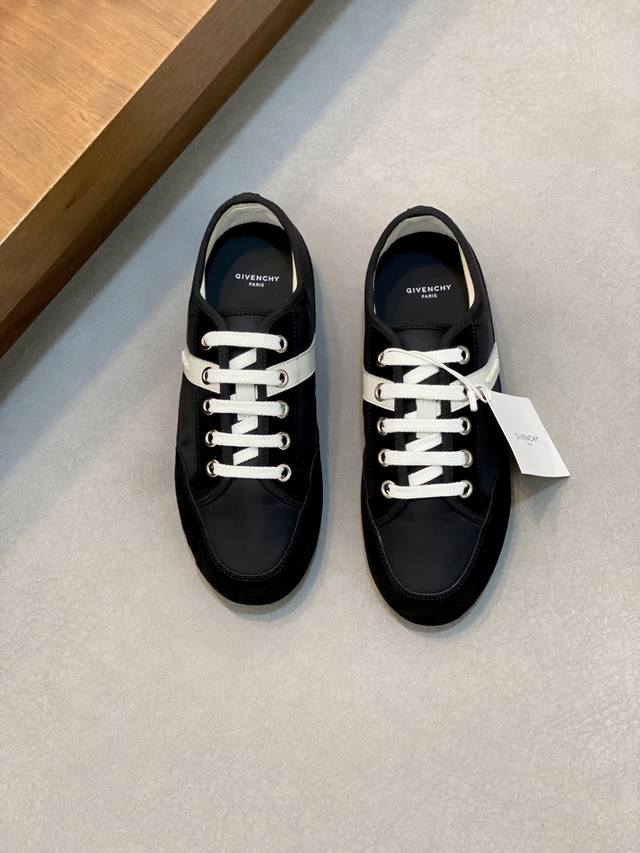 Givenchy Slim low-top sneakers . These lace-up sneakers are crafted from a comb